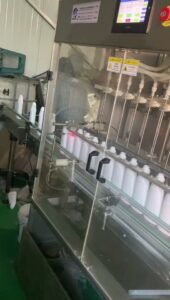 Automatic Detergent Liquid Filling Line with Capping, Labeling and Carton Taping