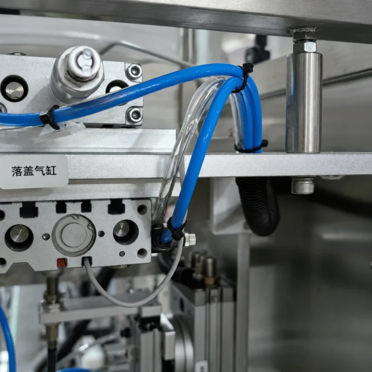 Pneumatic cylinder detail for a weighing filling production line