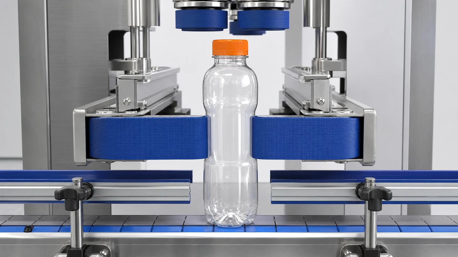 Bottle held between opposing gripper belts without visible deformation during capping