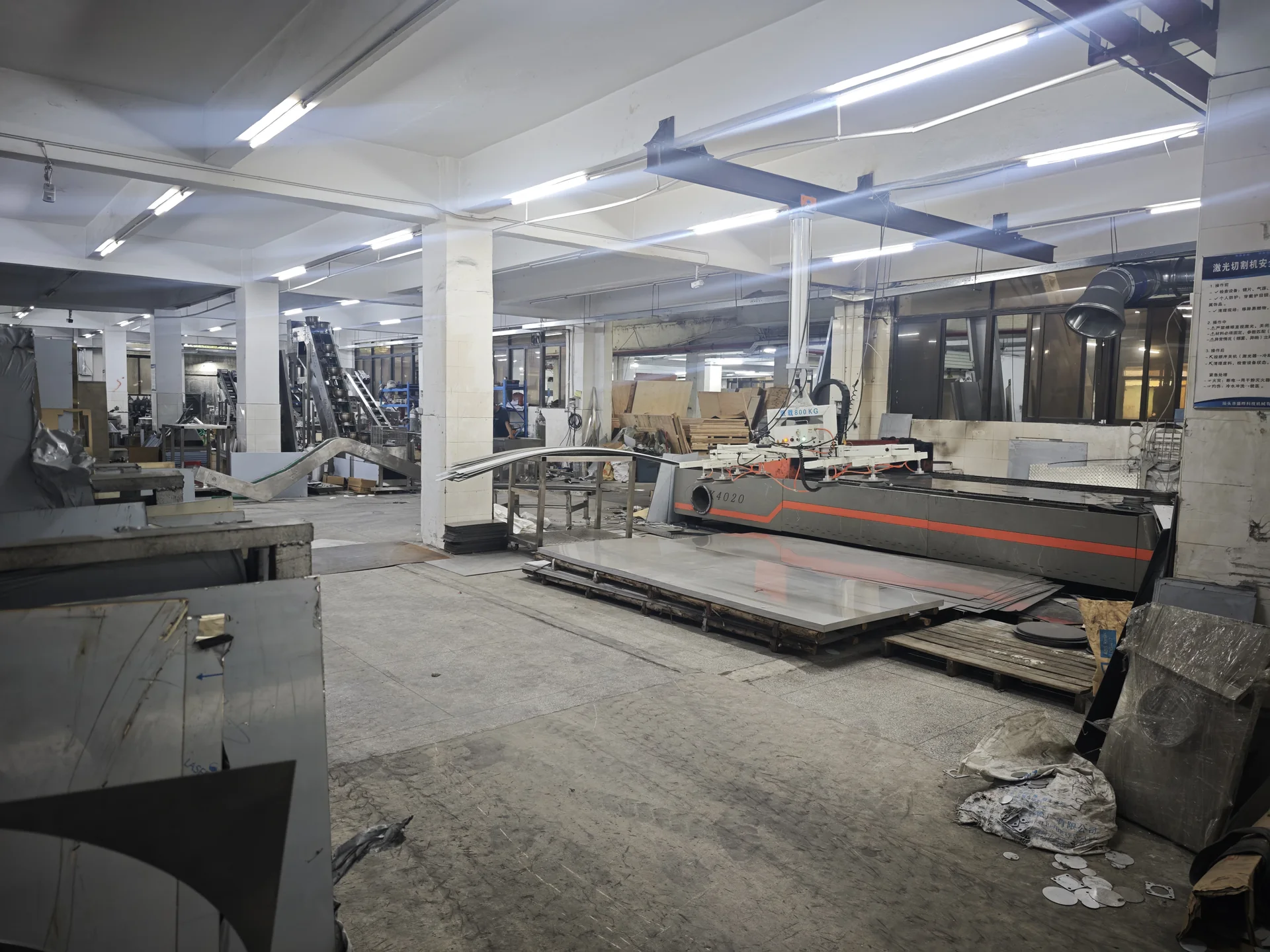 LEKA factory sheet metal workshop with laser cutting equipment and stainless steel sheets